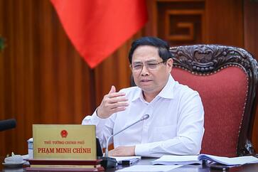 Phó Thủ tướng Trần Hồng Hà (phải) và Bí thư Thành ủy Đà Nẵng Nguyễn Văn Quảng tại cuộc họp.