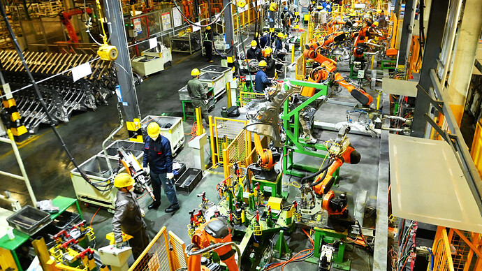 QINGDAO, CHINA - MARCH 01 2025: People work on the production line of auto parts at a carmaker in Qingdao in east China's Shandong province Saturday, March 01, 2025. China's official Manufacturing PMI returned to expansion in February. (Photo credit should read YU FANGPING / Feature China/Future Publishing via Getty Images)