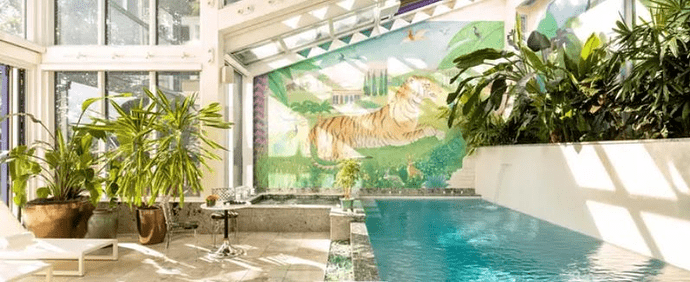 Một cổ phiếu tăng giá 1.500% trong vài năm ngăn ngủi, nhiều nhà đầu tư mua vào từ thuở công ty ‘vô danh’ nay đổi đời: Mua nhà, tậu xe, ung dung nghỉ hưu vô lo nghĩ- Ảnh 2.