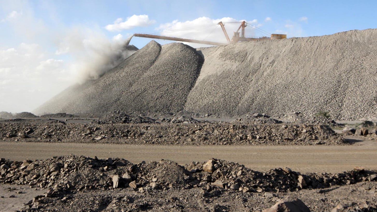 A mining machine is seen at the Bayan Obo mine containing rare earth minerals, in Inner Mongolia, China July 16, 2011. Picture taken July 16, 2011. REUTERS/Stringer ATTENTION EDITORS - THIS IMAGE WAS PROVIDED BY A THIRD PARTY. CHINA OUT. A mining machine is seen at the Bayan Obo mine containing rare earth minerals, in Inner Mongolia, China July 16, 2011. Picture taken July 16, 2011. REUTERS/Stringer ATTENTION EDITORS - THIS IMAGE WAS PROVIDED BY A THIRD PARTY. CHINA OUT.