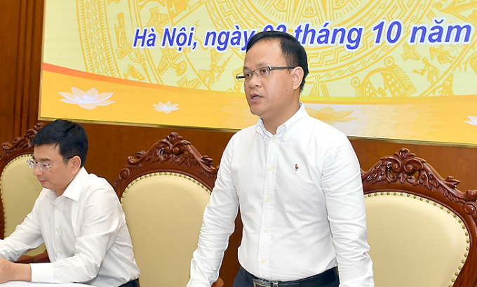 Ông Phạm Chí Quang, Vụ trưởng Vụ Chính sách tiền tệ (ngoài cùng bên trái), chia sẻ tại cuộc họp báo thường niên quý III/2025 của Ngân hàng Nhà nước. Ảnh: BTC