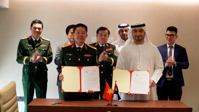 Viettel và ABI đã ký Biên bản cuộc họp, thể hiện rõ thiện chí và mong muốn tăng cường hợp tác. Ảnh: Bộ Quốc phòng